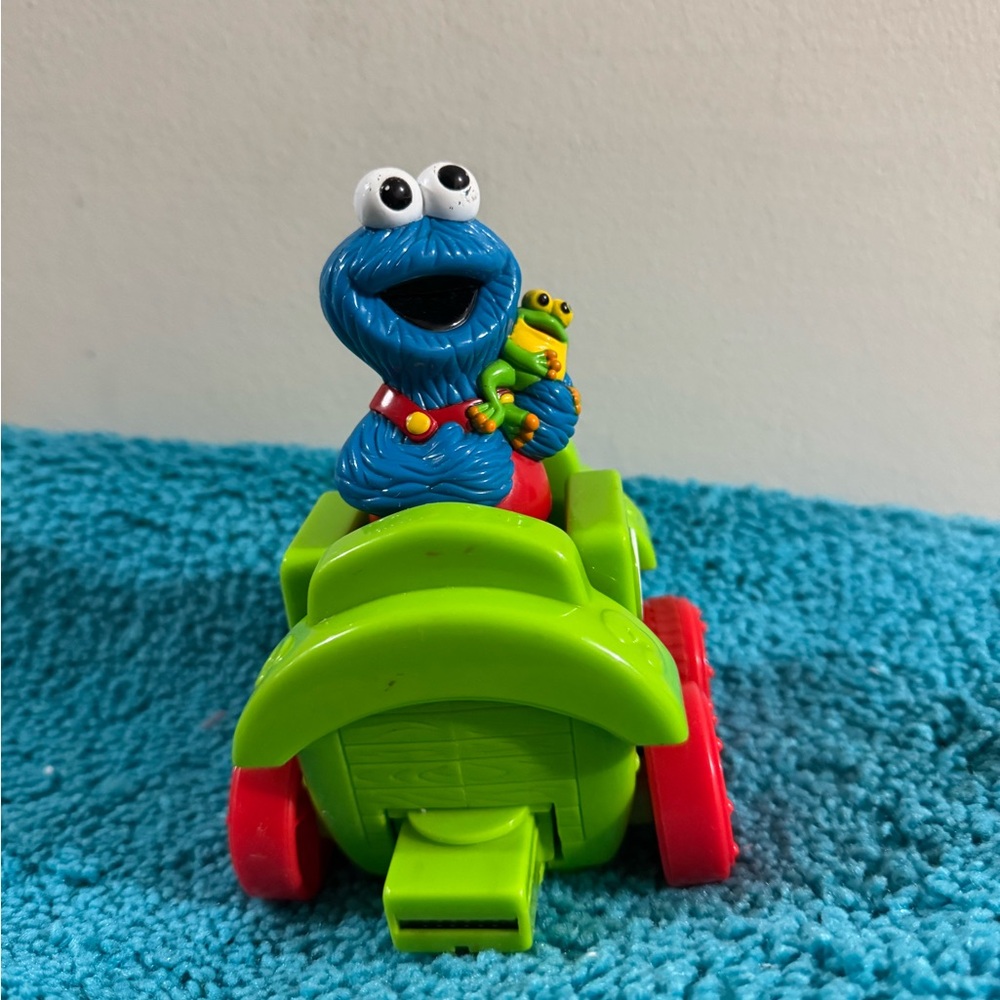 Green and Red Character Toy Car